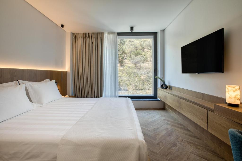 A bed or beds in a room at Neoma