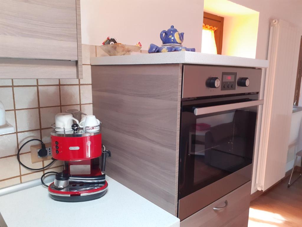 Kuchyňa alebo kuchynka v ubytovaní Acero Rosso