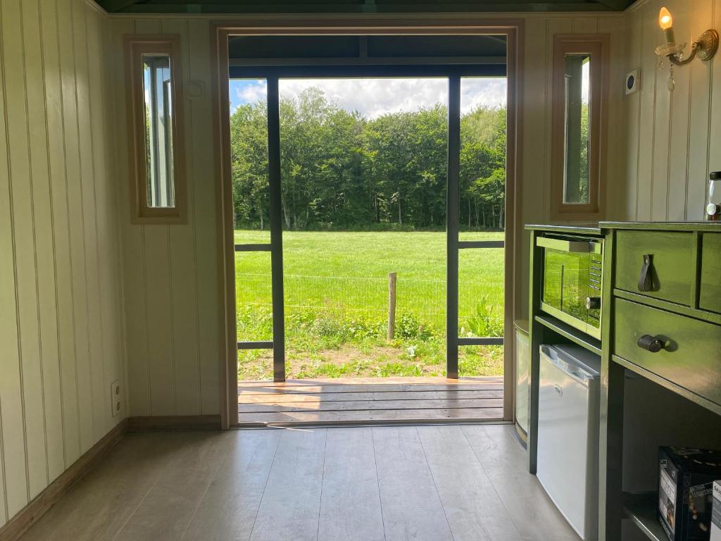 Zahrada ubytování Tiny house, pipowagen onder de kastanje