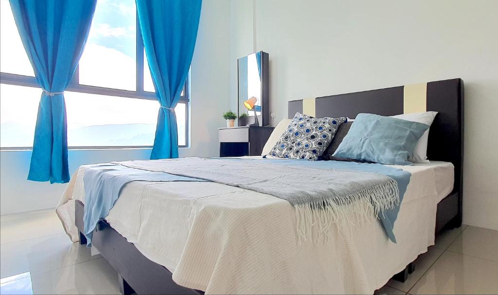 Postel nebo postele na pokoji v ubytování Ipoh Meru Casa Kayangan by BeeStay
