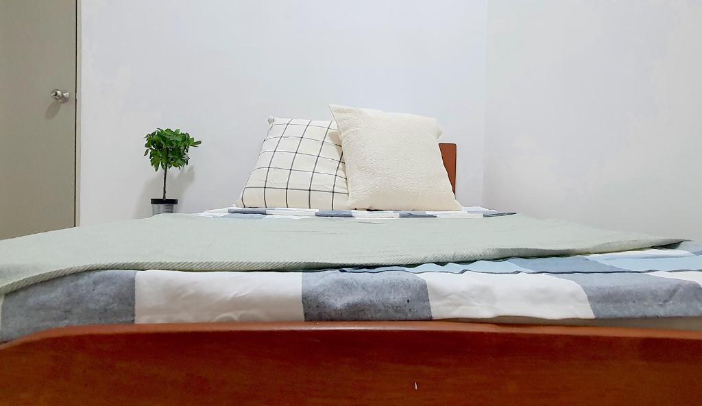 Postel nebo postele na pokoji v ubytování Ipoh Meru Casa Kayangan by BeeStay