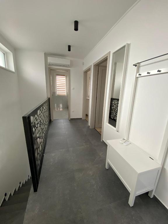 TV a/nebo společenská místnost v ubytování TWIN HOUSE