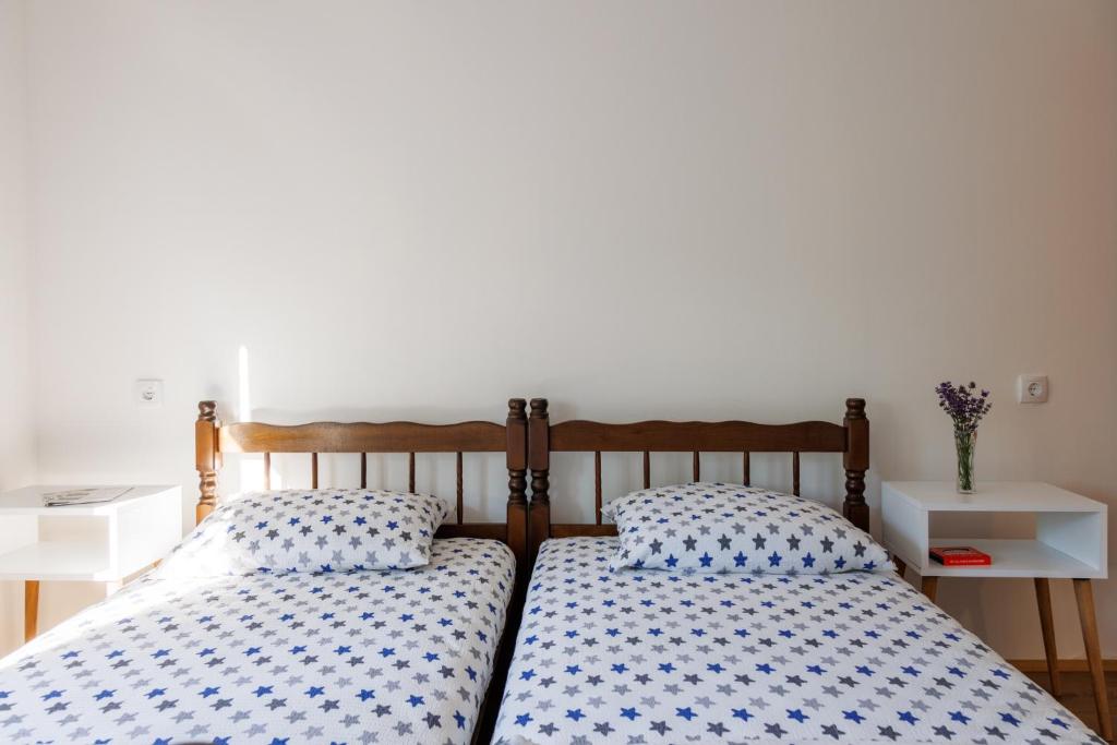Postel nebo postele na pokoji v ubytování Vila Peristeron