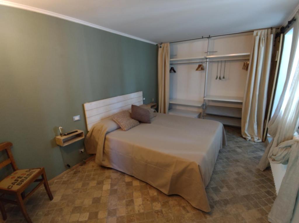 Postel nebo postele na pokoji v ubytování Agriturismo Peq Agri-Resort Tovo