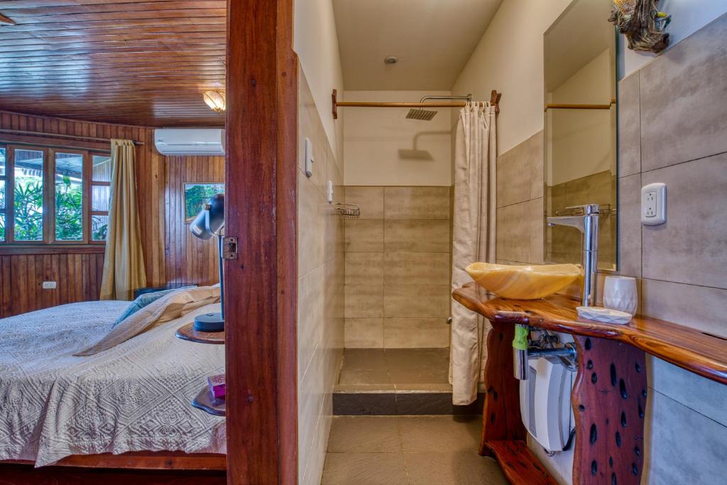 Postel nebo postele na pokoji v ubytování Hotel Amor de Mar