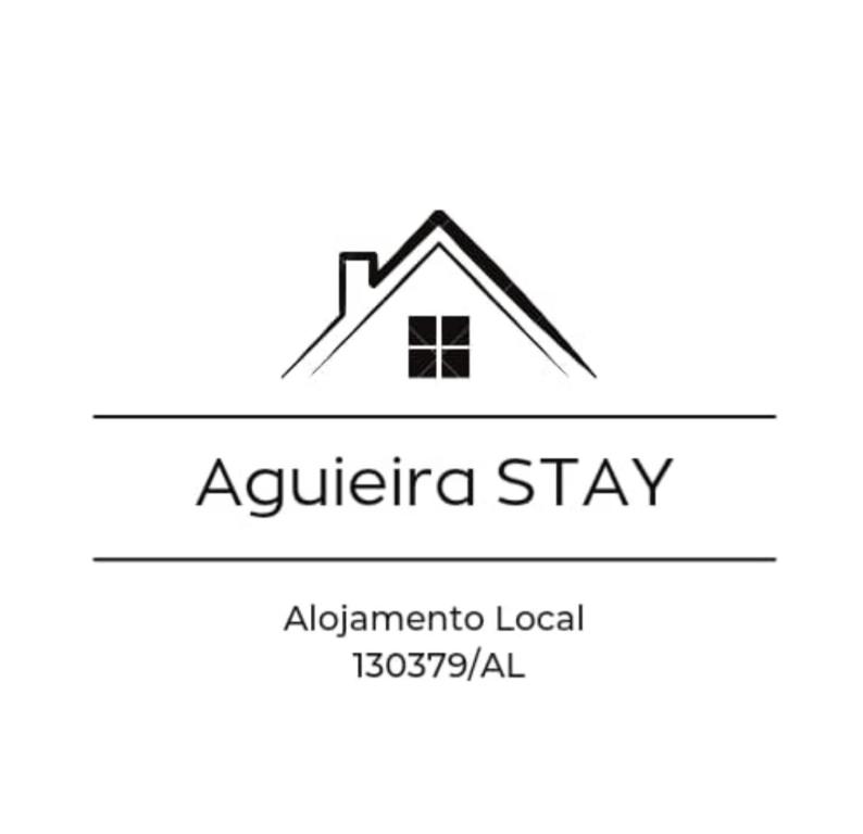 a house logo with the words australia stay at Aguieira STAY in Castro Daire
