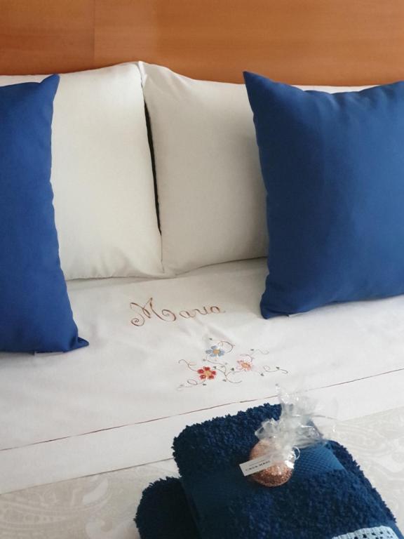 Postel nebo postele na pokoji v ubytování Casa Maria