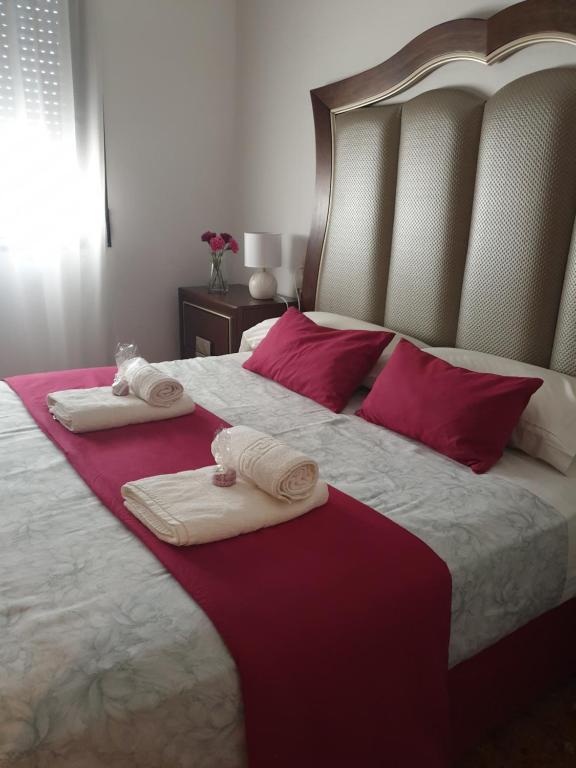 Postel nebo postele na pokoji v ubytování Casa Maria