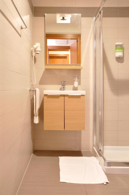 Koupelna v ubytování Hotel Mezzaluna