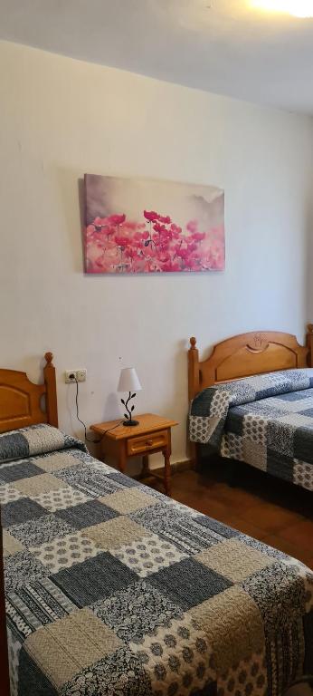 Postel nebo postele na pokoji v ubytování Alojamiento Turístico El Pantano de Cazorla