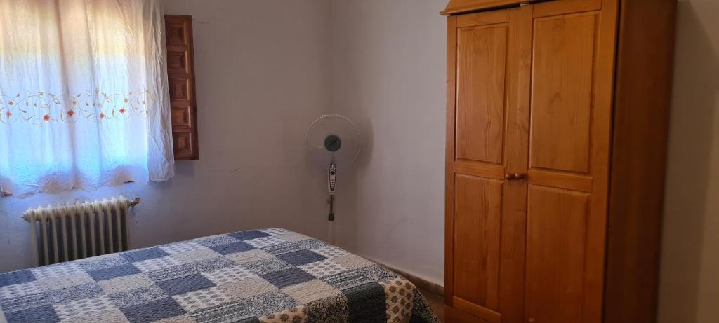 Postel nebo postele na pokoji v ubytování Alojamiento Turístico El Pantano de Cazorla
