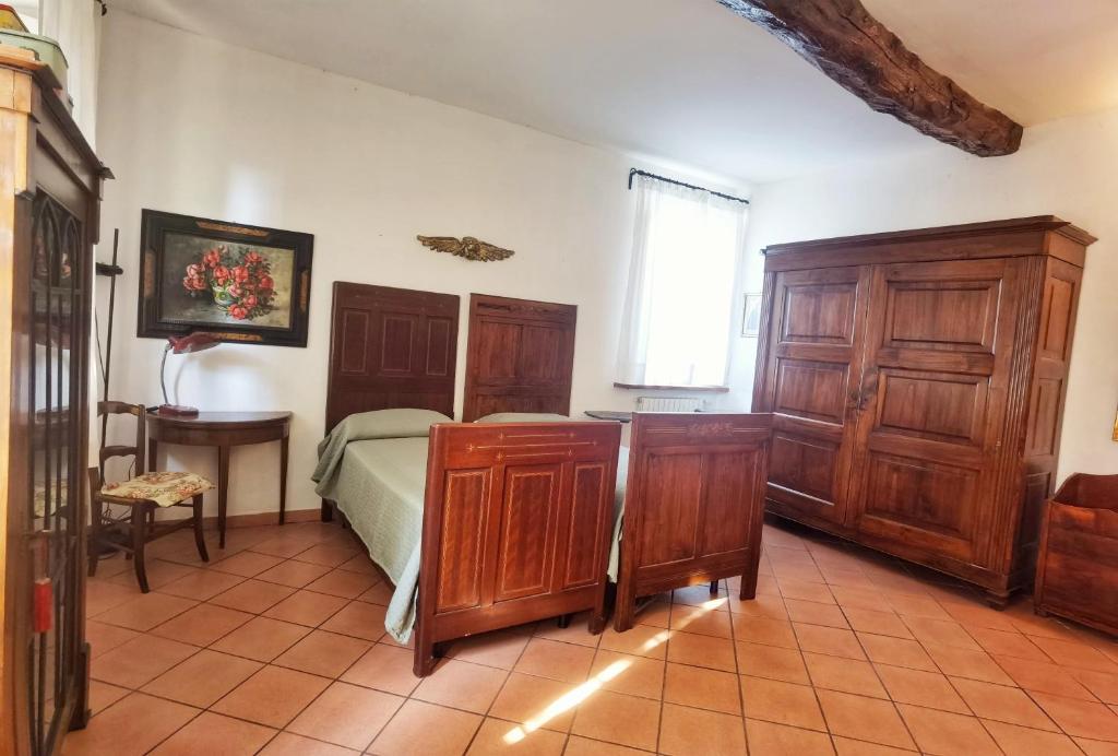 Postel nebo postele na pokoji v ubytování B&B Due Fiumi 1908