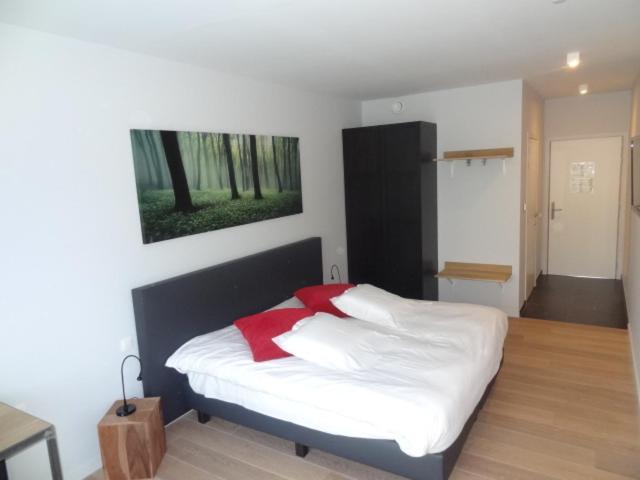 Postel nebo postele na pokoji v ubytování Hotel Kasteelhof 'T Hooghe