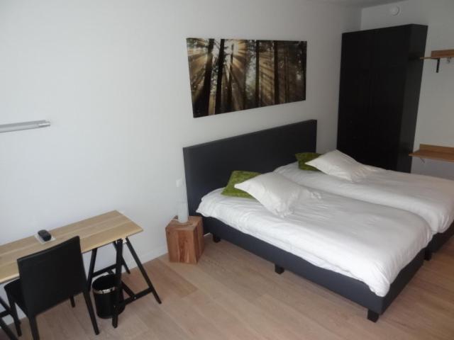 Postel nebo postele na pokoji v ubytování Hotel Kasteelhof 'T Hooghe