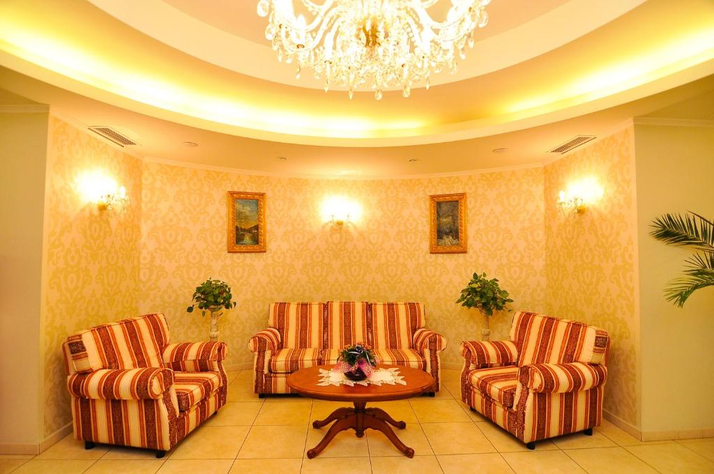 Posezení v ubytování Hotel Maxim