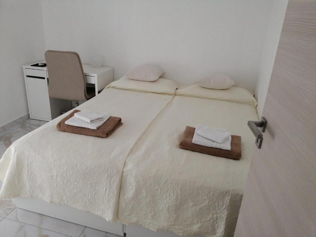 Posteľ alebo postele v izbe v ubytovaní Diana'S Exclusive Apartment