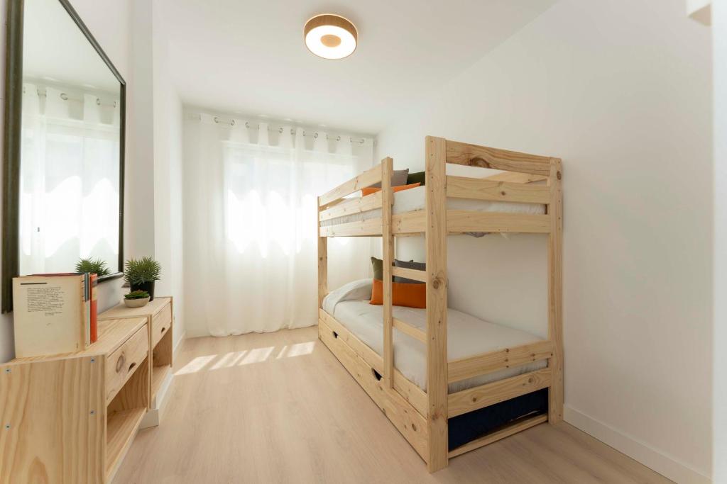 Posteľ alebo postele v izbe v ubytovaní Apartamento de lujo de dos dormitorios