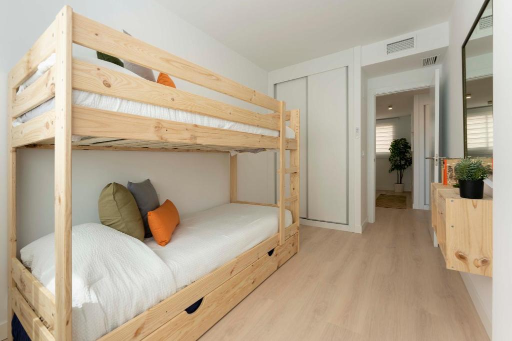 Posteľ alebo postele v izbe v ubytovaní Apartamento de lujo de dos dormitorios
