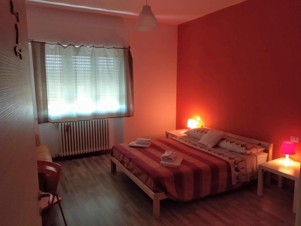 Postel nebo postele na pokoji v ubytování Orlando