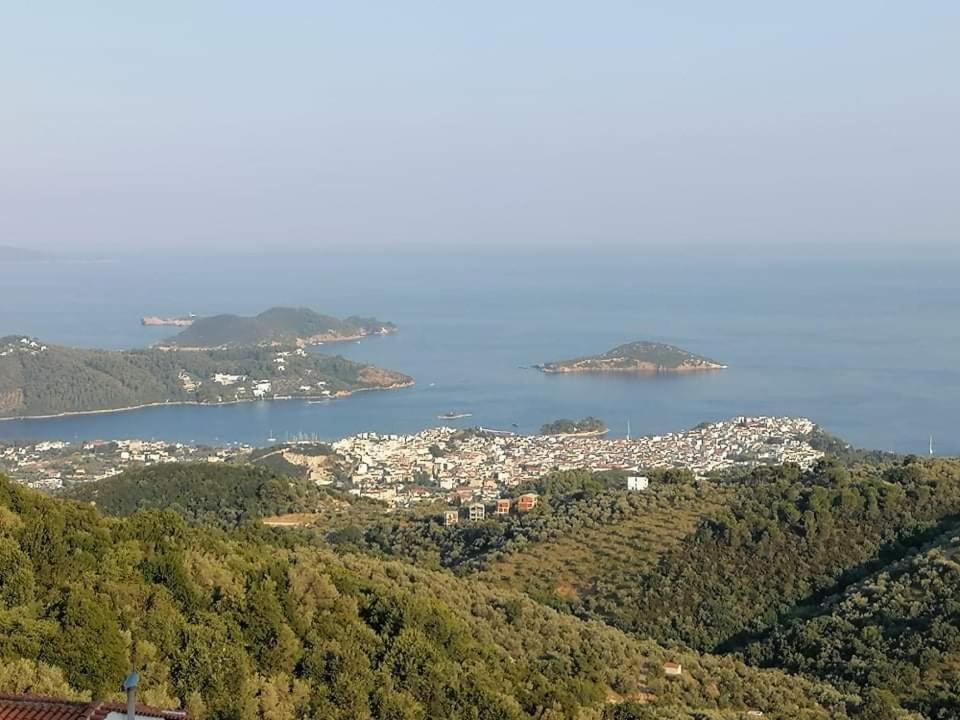 an aerial view of a city and the water at Alexandra's Studios in Kechria