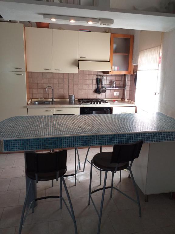 A kitchen or kitchenette at Residence San Antonio