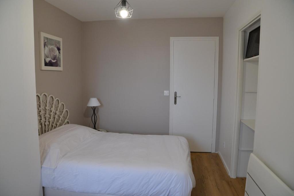 Postel nebo postele na pokoji v ubytování DNJ Appart Hotel