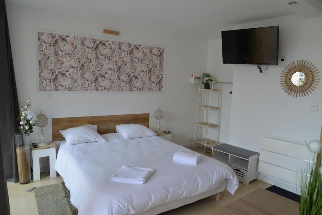 Postel nebo postele na pokoji v ubytování DNJ Appart Hotel
