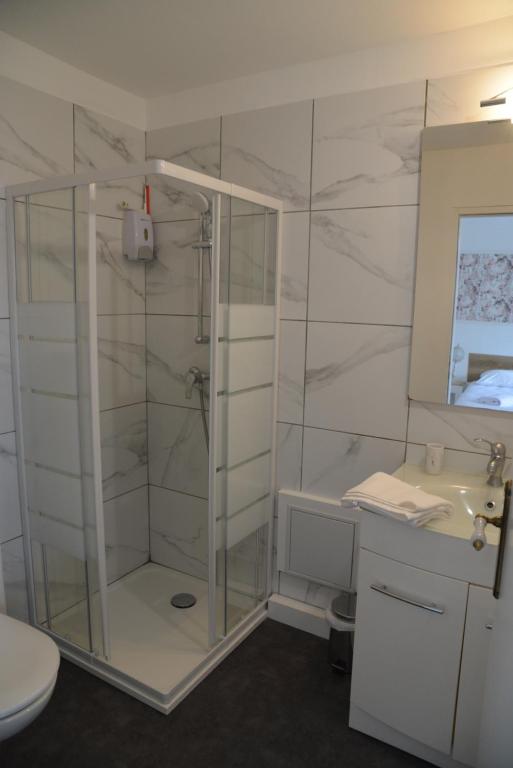 Koupelna v ubytování DNJ Appart Hotel
