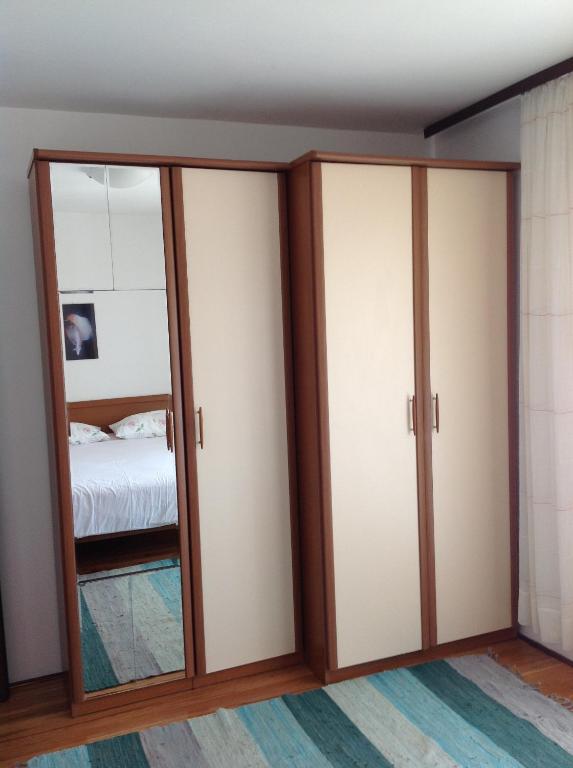 Postel nebo postele na pokoji v ubytování Apartmani Marko