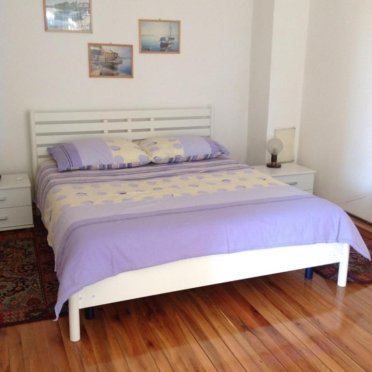 Postel nebo postele na pokoji v ubytování Apartmani Marko