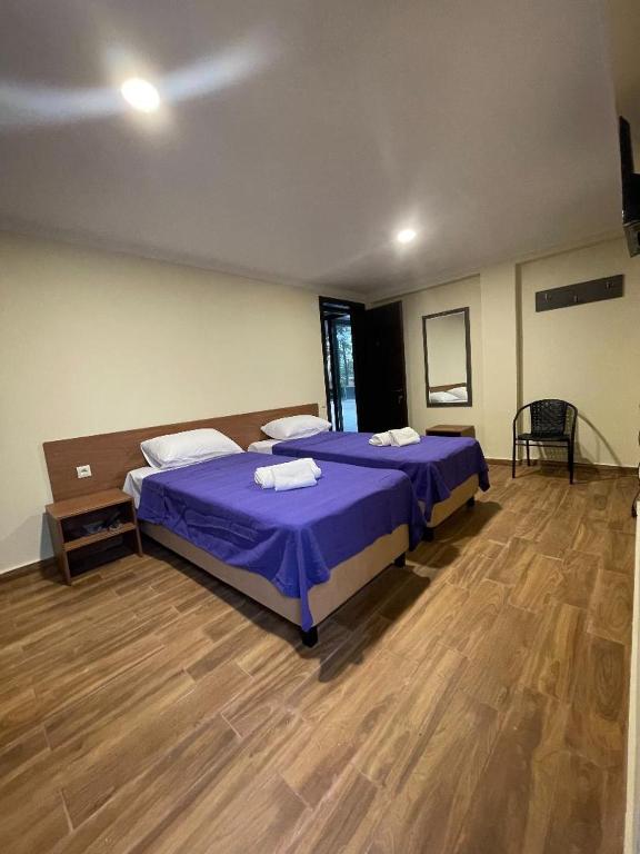 Postel nebo postele na pokoji v ubytování Villa Story Hotel