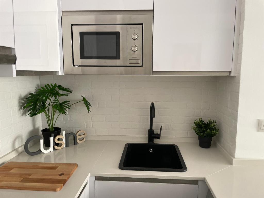 Kuchyňa alebo kuchynka v ubytovaní LUMINOSO APARTAMENTO RECIÉN REFORMADO