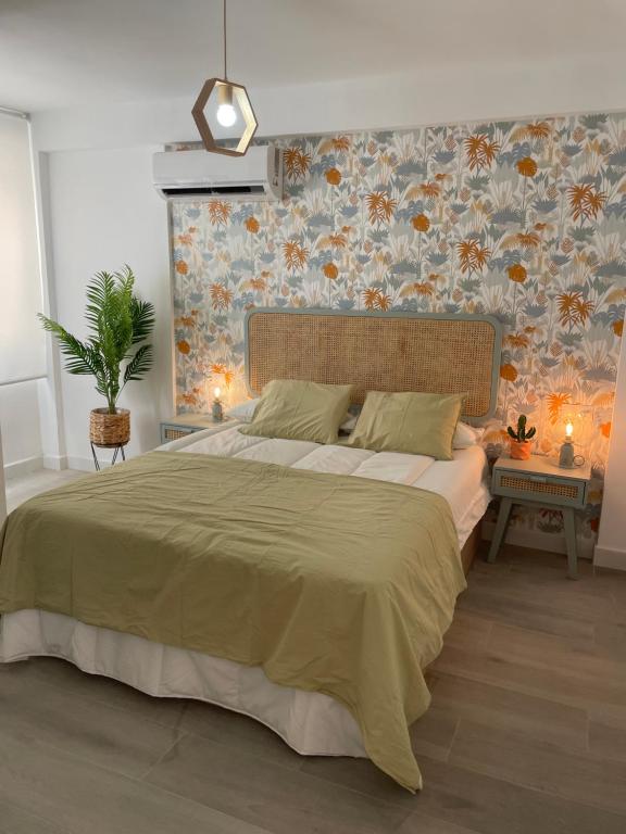 Posteľ alebo postele v izbe v ubytovaní LUMINOSO APARTAMENTO RECIÉN REFORMADO