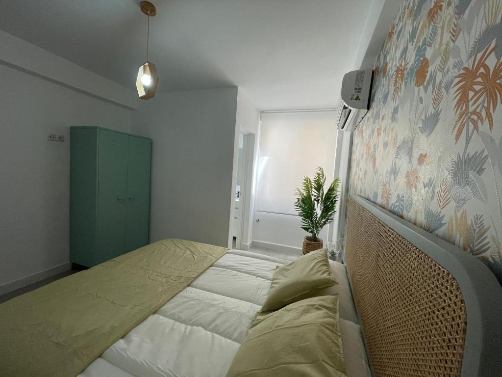 Posteľ alebo postele v izbe v ubytovaní LUMINOSO APARTAMENTO RECIÉN REFORMADO