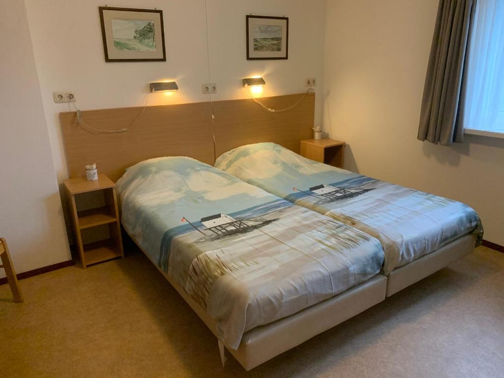Postel nebo postele na pokoji v ubytování B&B Molenaar
