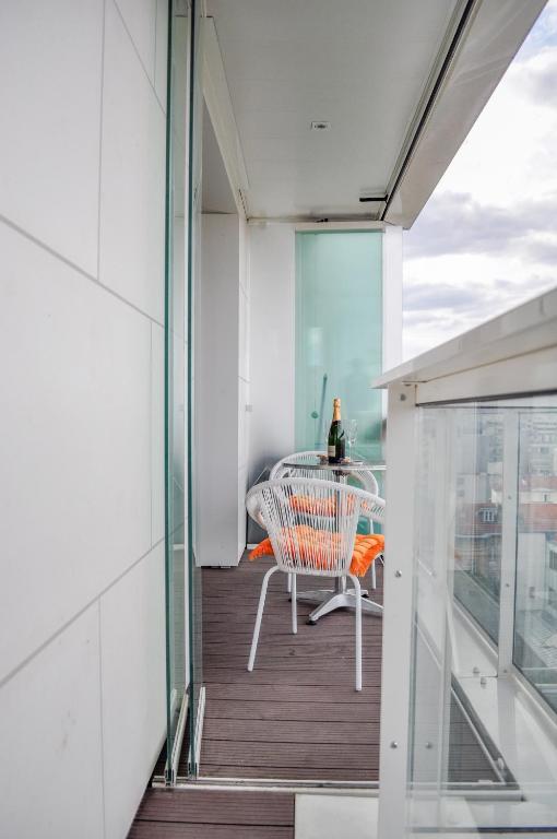 Balkon lub taras w obiekcie Vue exceptionnelle sur la tour Eiffel