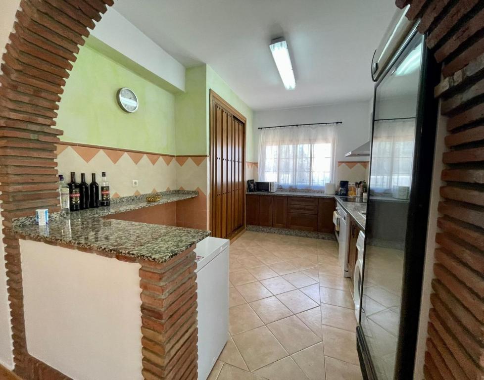Kuchyňa alebo kuchynka v ubytovaní FINCA EL ALMENDRO