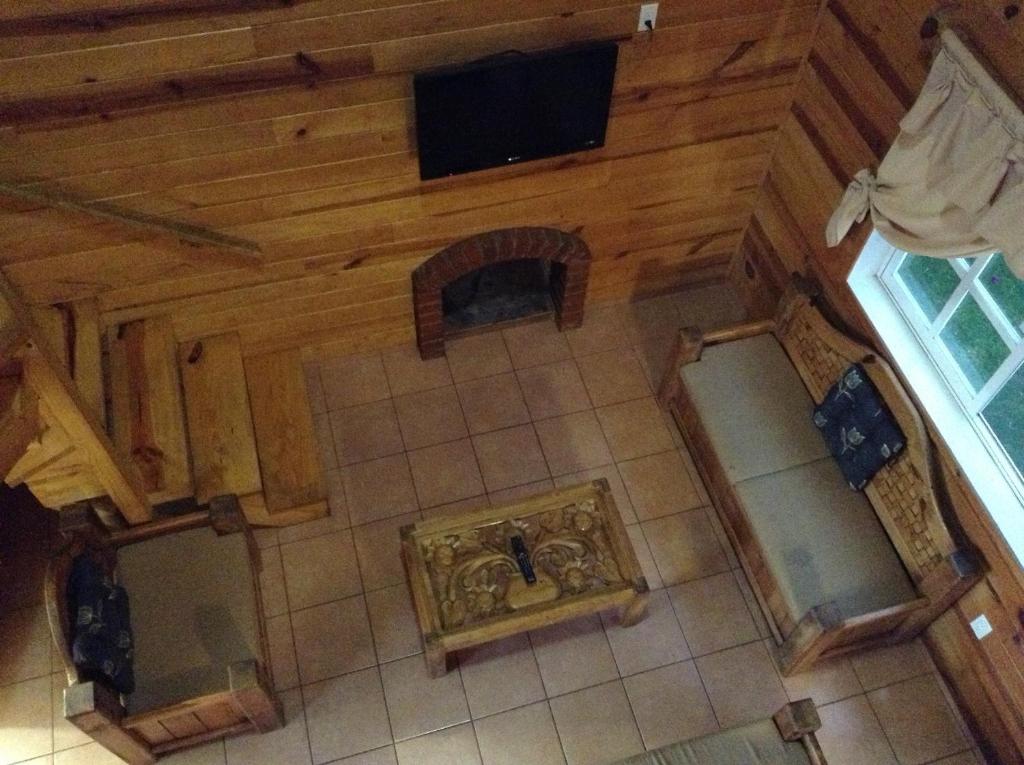 TV a/nebo společenská místnost v ubytování Cabanas El Cerrito