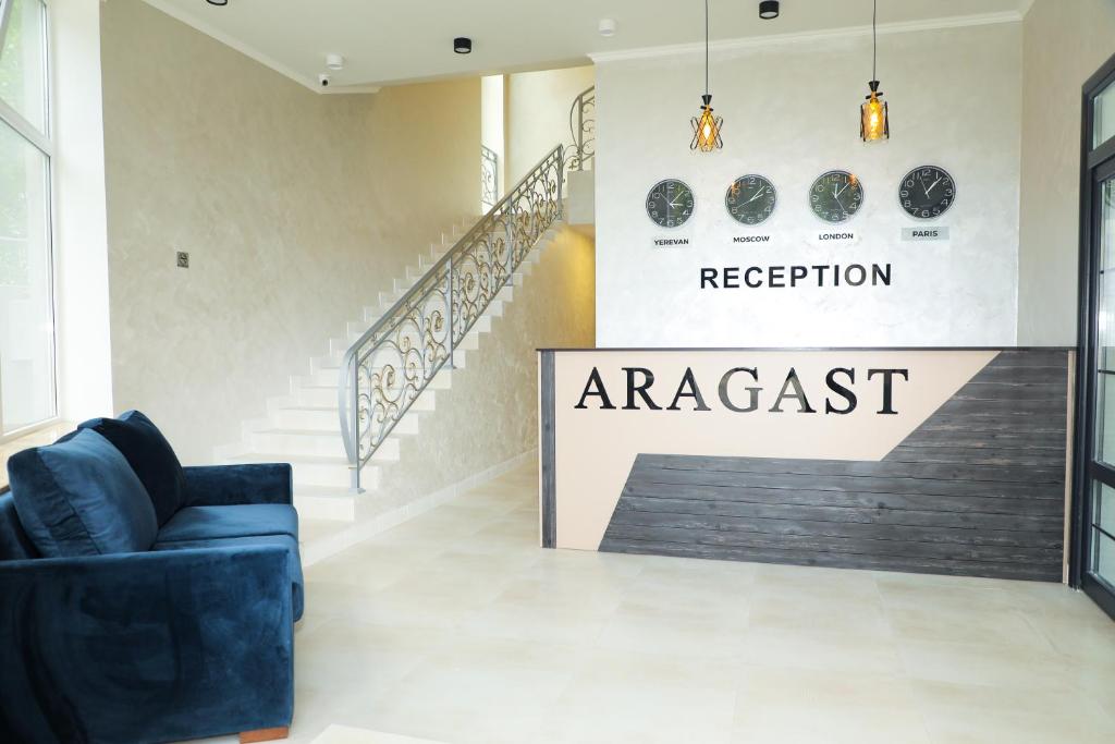 a lobby with a sign that reads argentinian respect at ARAGAST HOTEL & BREWERY пивоварня in Sevan