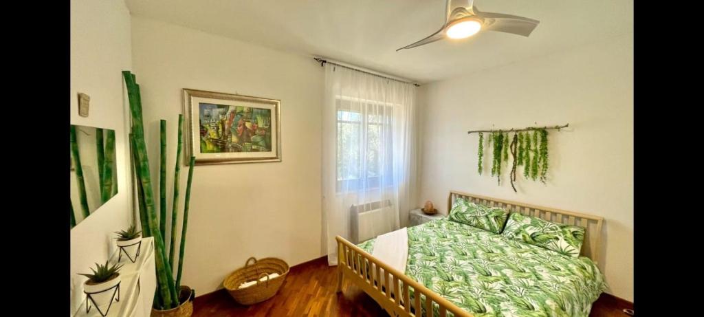 Postel nebo postele na pokoji v ubytování L'oasi della Pace
