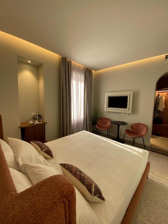 TV a/nebo společenská místnost v ubytování NoOne Tropea Guesthouse
