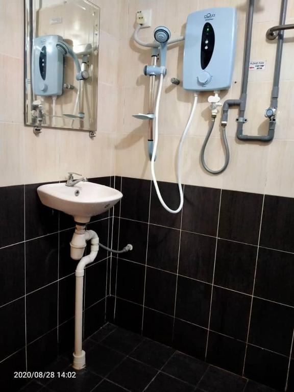 Koupelna v ubytování TAMIM SUITE GROUP HOTEL Dungun