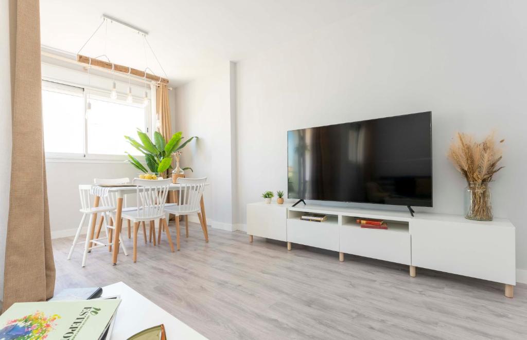 TV a/nebo společenská místnost v ubytování Apartamento de lujo de un dormitorio