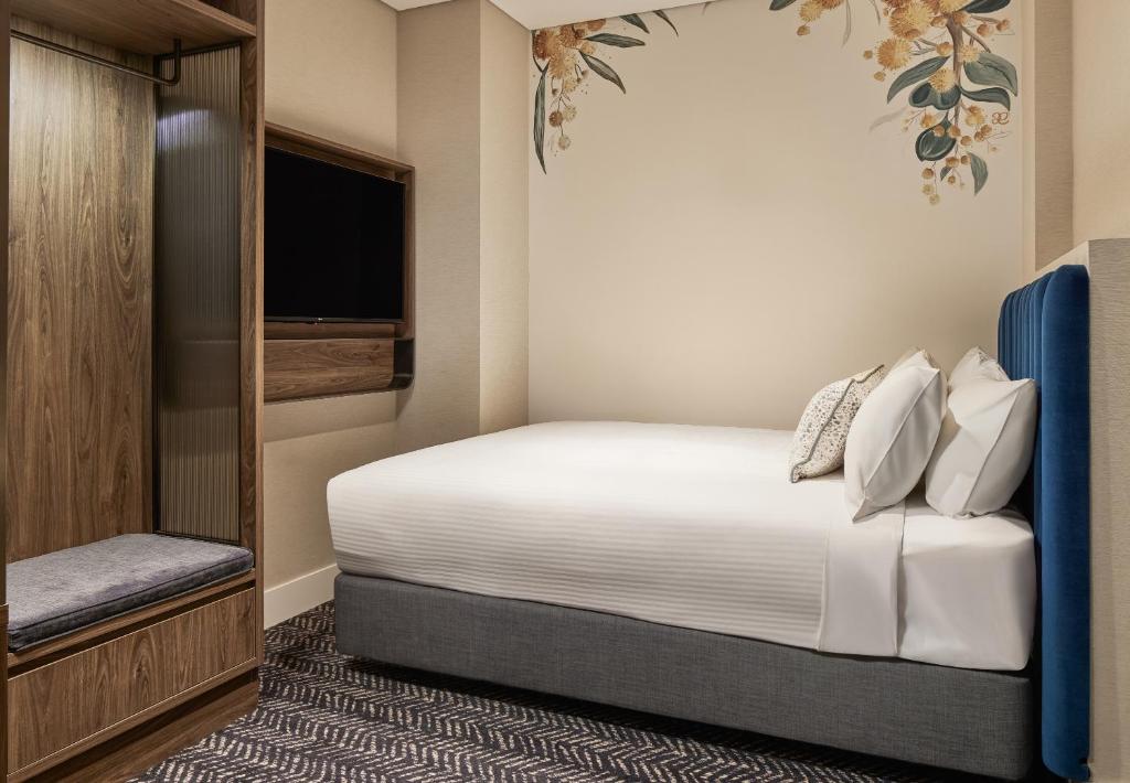 Postel nebo postele na pokoji v ubytování Aiden by Best Western Darling Harbour
