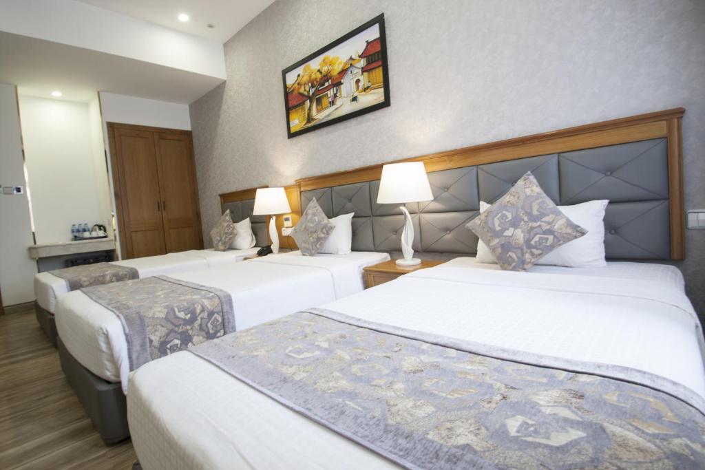Acnos Grand Hotel - Driepersoonskamer