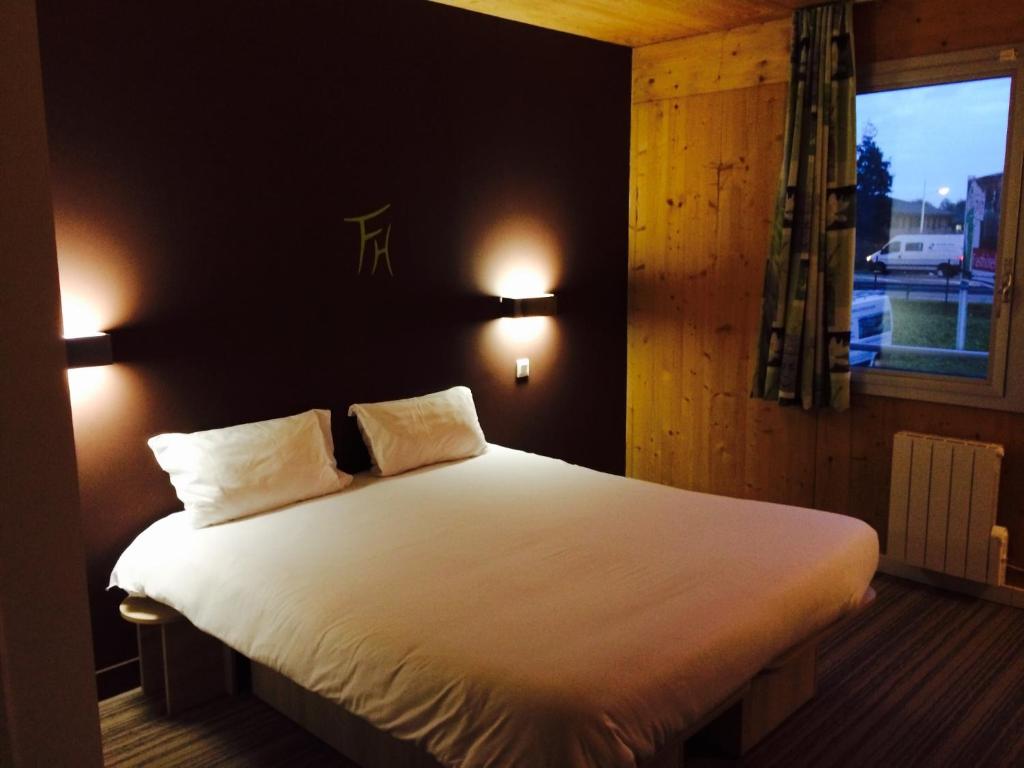 Postel nebo postele na pokoji v ubytování Fasthotel Dunkerque