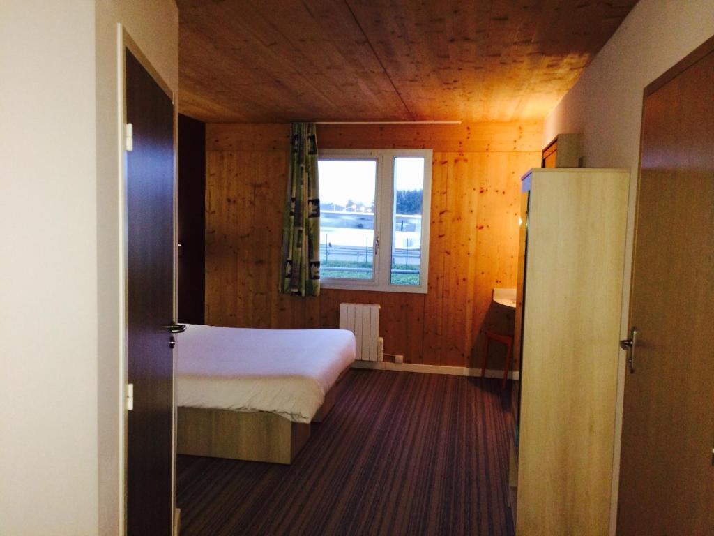 Postel nebo postele na pokoji v ubytování Fasthotel Dunkerque