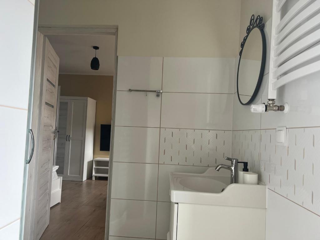 Kúpeľňa v ubytovaní Apartament MRĄGOWIA