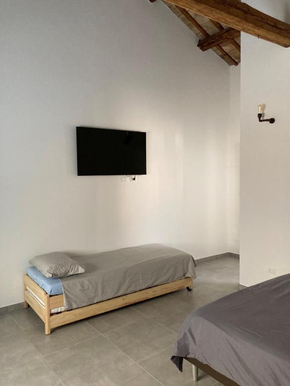Postel nebo postele na pokoji v ubytování AL RUDERINO