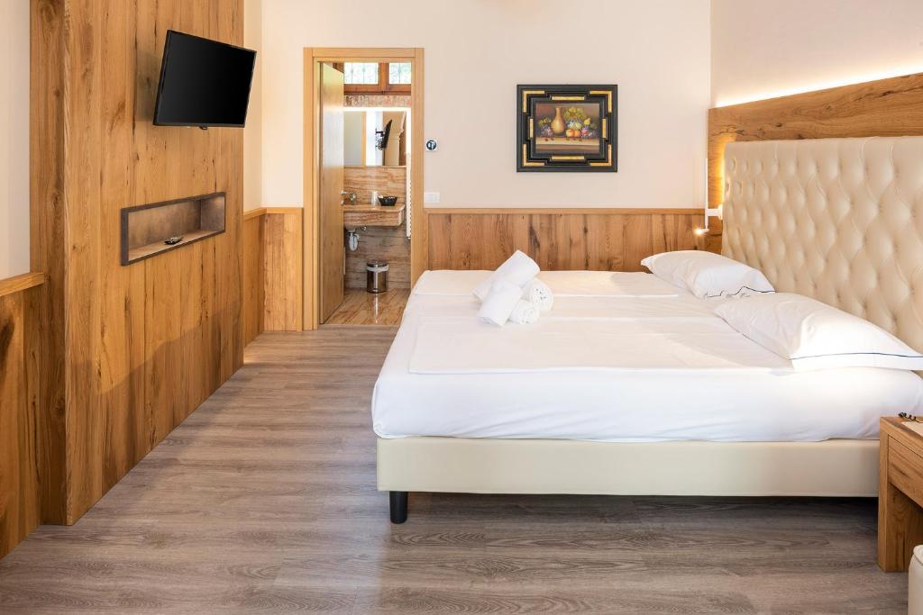 Postel nebo postele na pokoji v ubytování Hotel Du Parc